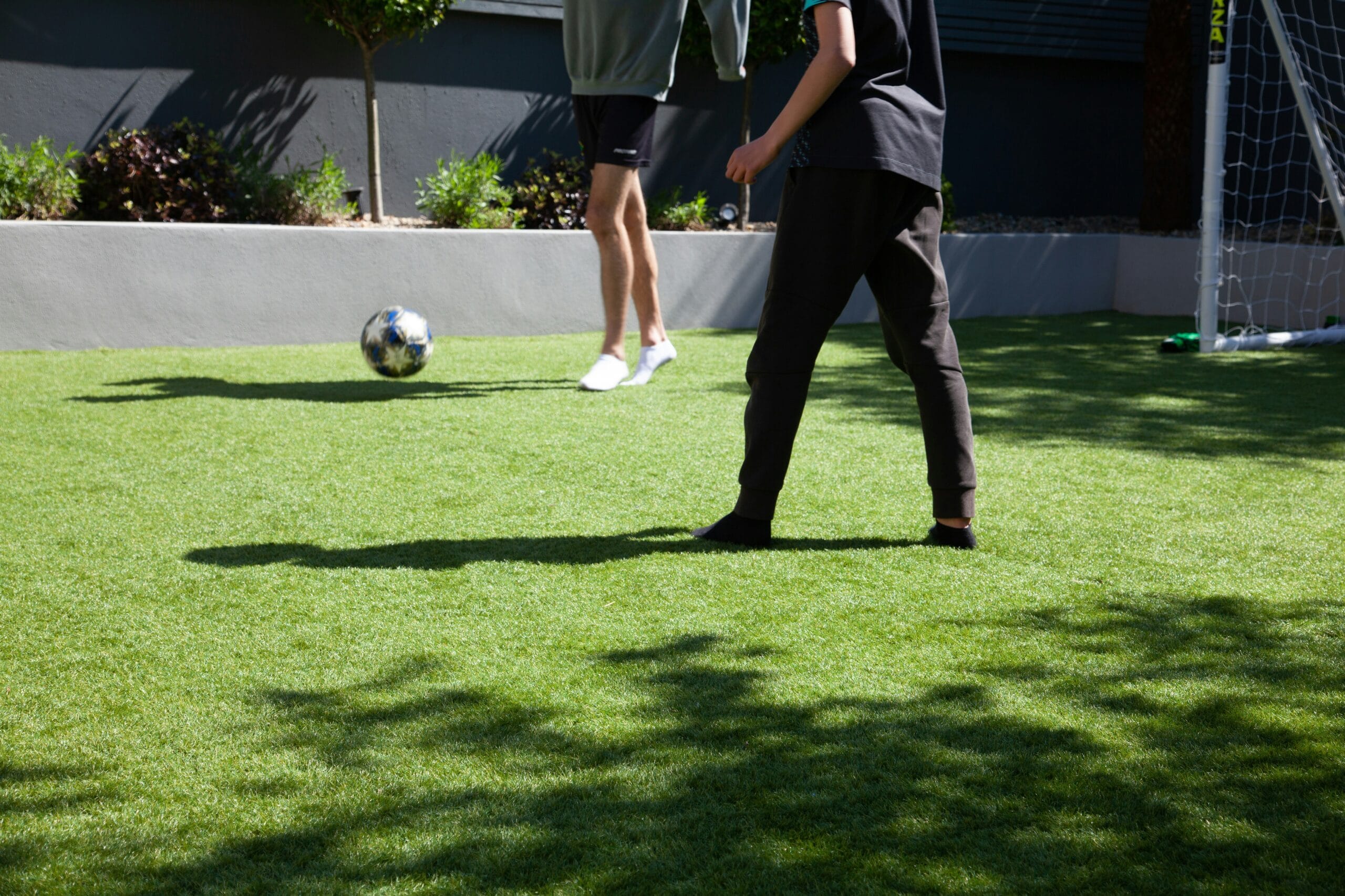 With artificial turf, you can turn your backyard into a sports zone for small games